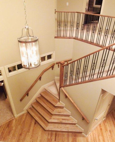 Idées déco pour un escalier classique de taille moyenne avec des marches en bois et des contremarches en bois.