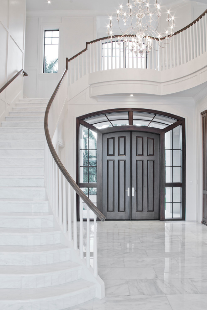 Traditional curved staircase in Miami.