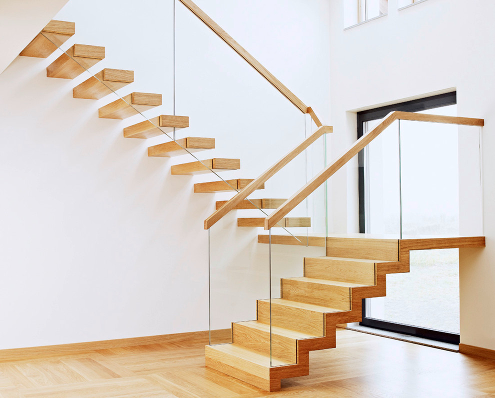 This is an example of a contemporary staircase in London with open risers.