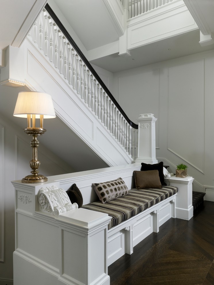Inspiration for a traditional staircase in Chicago with feature lighting.