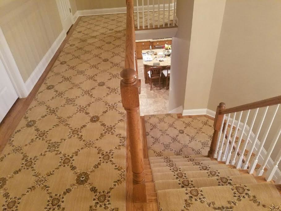 Example of a large classic wooden l-shaped staircase design in New York with painted risers