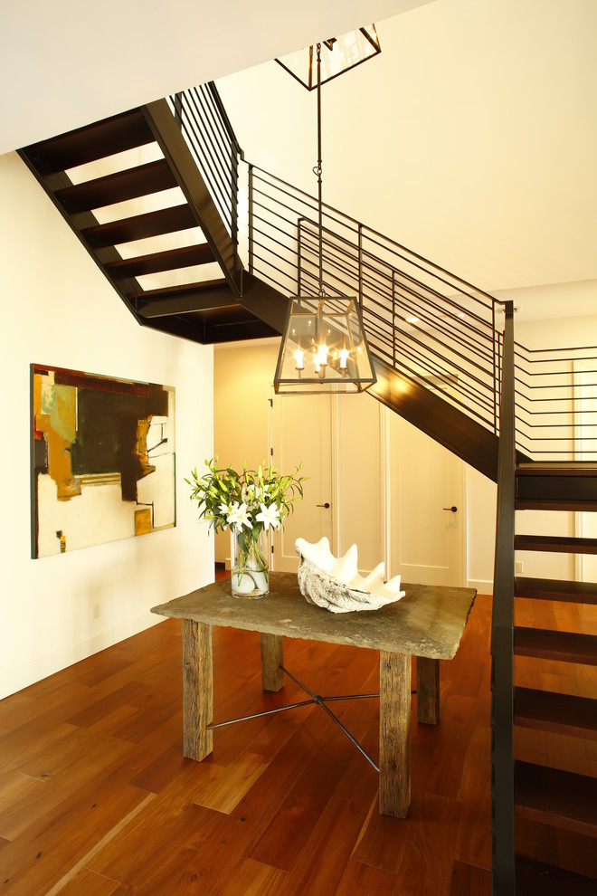 Inspiration for a contemporary u-shaped staircase remodel in Denver
