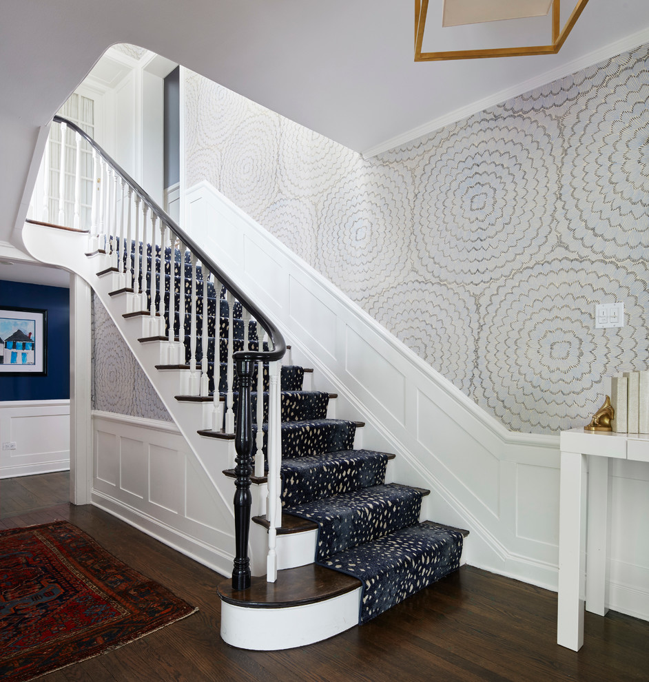 Inspiration for a medium sized traditional wood straight staircase in Chicago with painted wood risers.