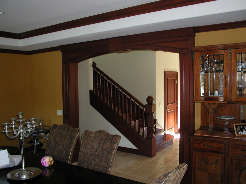 Staircase and arch Traditional Staircase Orange County by Heil