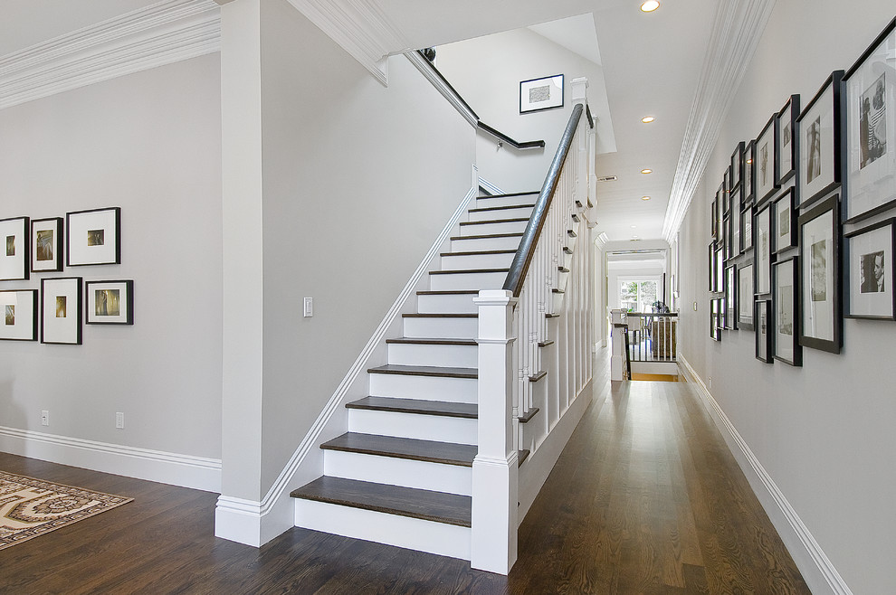 Inspiration for a timeless wooden staircase remodel in San Francisco