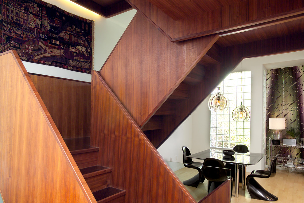This is an example of a contemporary wood staircase in Toronto with wood risers.
