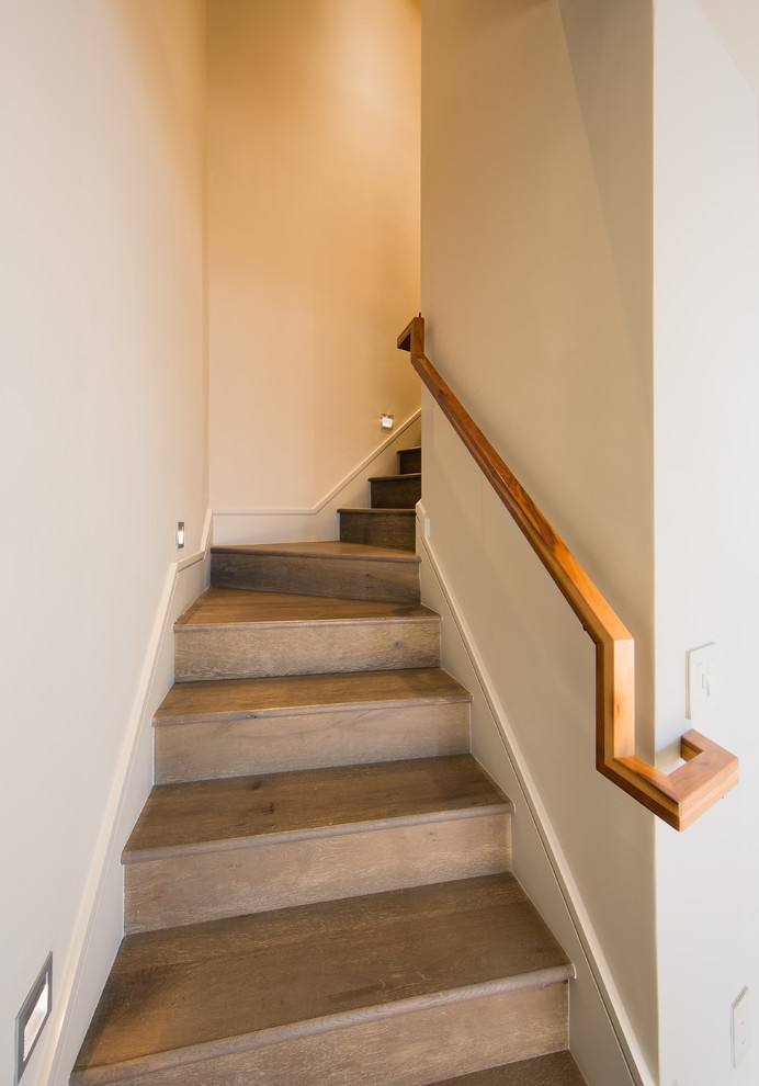 Example of a mid-sized trendy wooden l-shaped staircase design in San Francisco with wooden risers