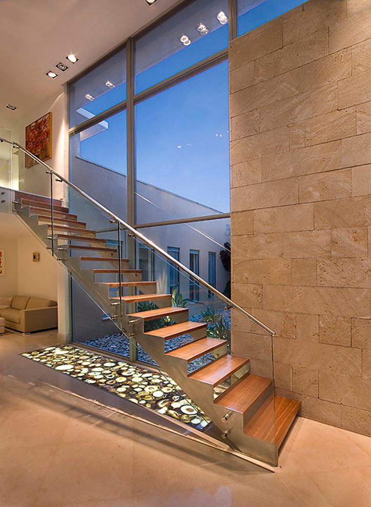 Example of a minimalist floating staircase design in Other