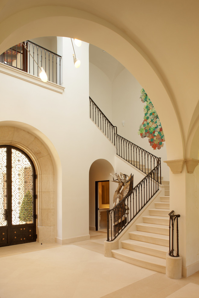 Inspiration for an expansive mediterranean u-shaped staircase in Los Angeles.