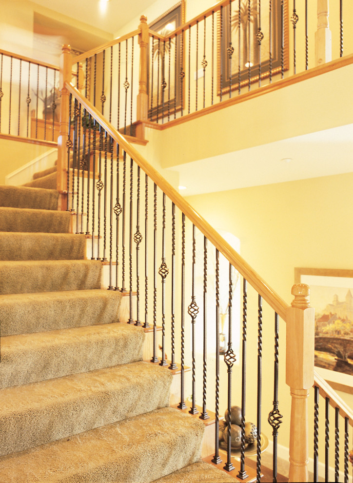 Inspiration for a mid-sized timeless carpeted l-shaped staircase remodel in San Francisco with carpeted risers