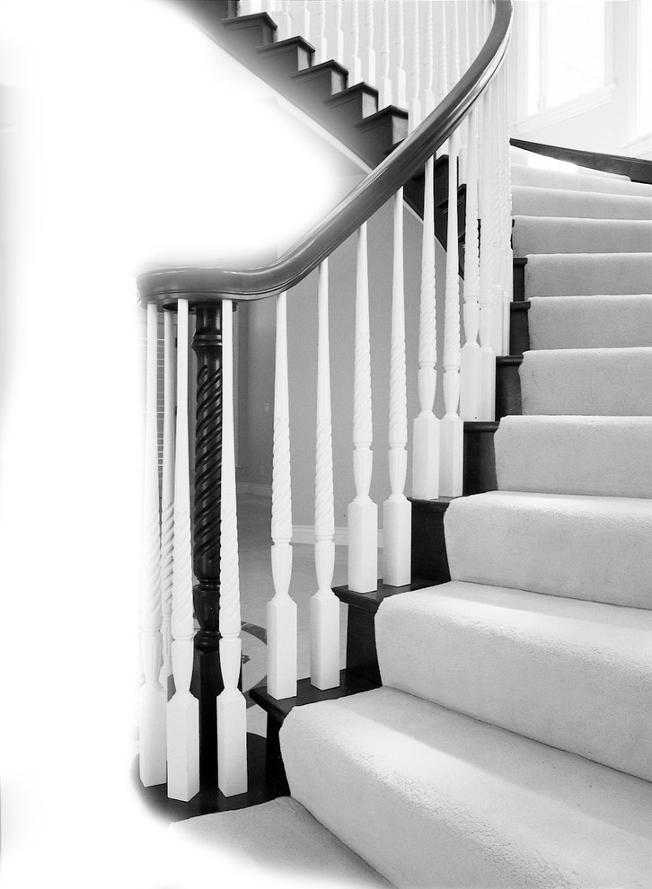 Example of a mid-sized classic carpeted curved staircase design in San Francisco with carpeted risers