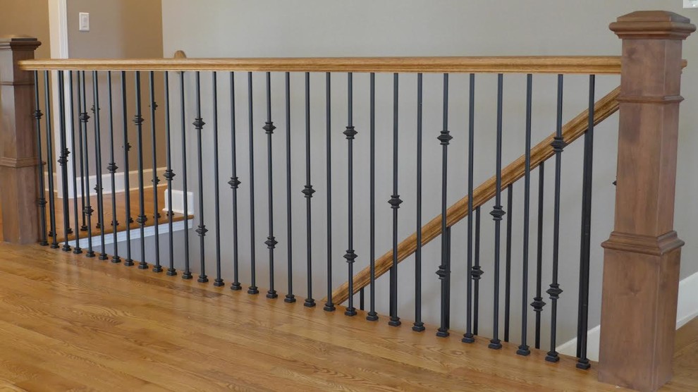 Staircase - mid-sized modern wooden straight staircase idea in Denver with wooden risers