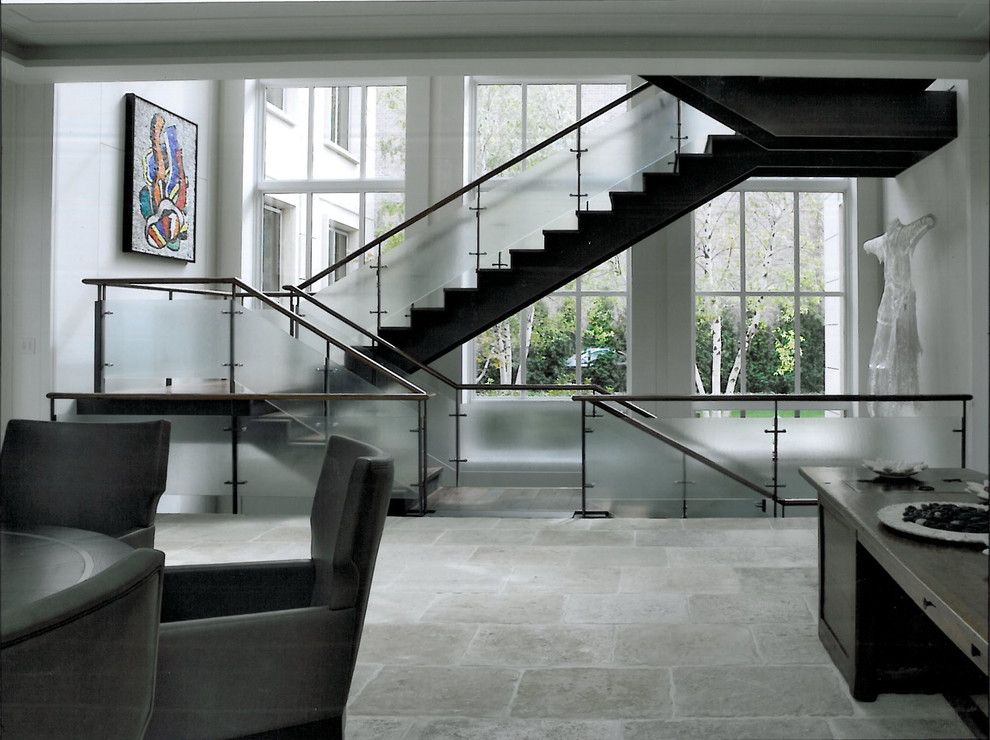 This is an example of a contemporary u-shaped glass railing staircase in Chicago.