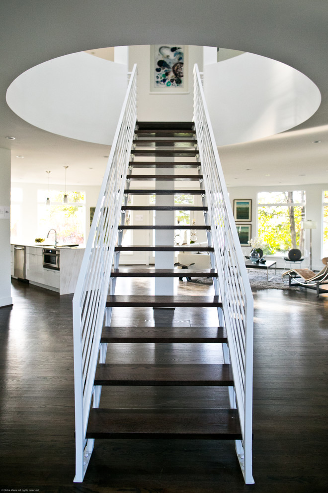 Inspiration for a contemporary wood straight staircase in Baltimore with open risers.