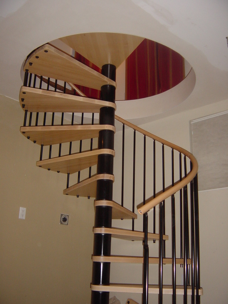 Photo of a small modern wood spiral staircase in San Francisco.