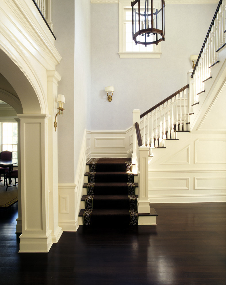 This is an example of a classic curved staircase in New York.