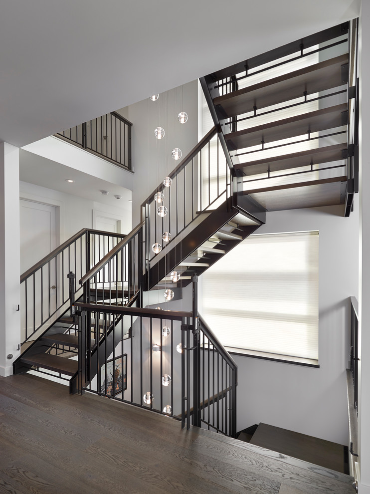 Inspiration for a contemporary wood staircase in Edmonton with open risers.