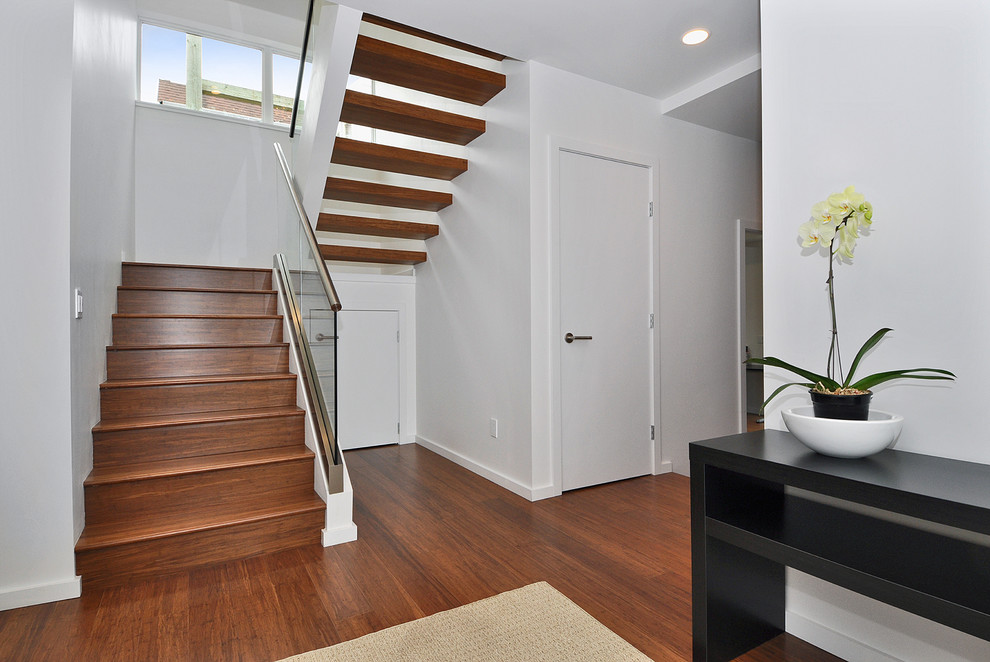 Photo of a contemporary staircase in Vancouver with open risers.