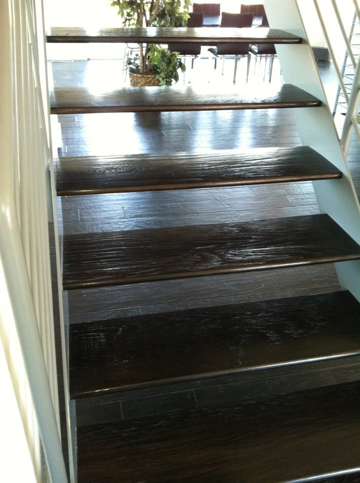 Photo of a medium sized traditional wood straight staircase in San Francisco with open risers.