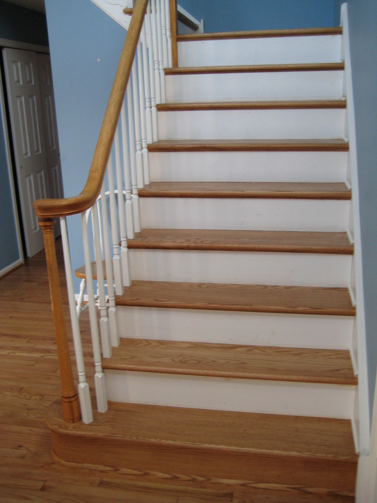 Medium sized traditional wood l-shaped staircase in Philadelphia with wood risers.