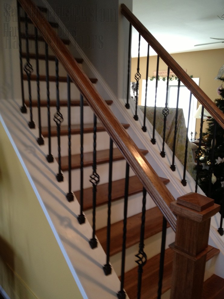 Inspiration for a small timeless wooden straight staircase remodel in Philadelphia with wooden risers