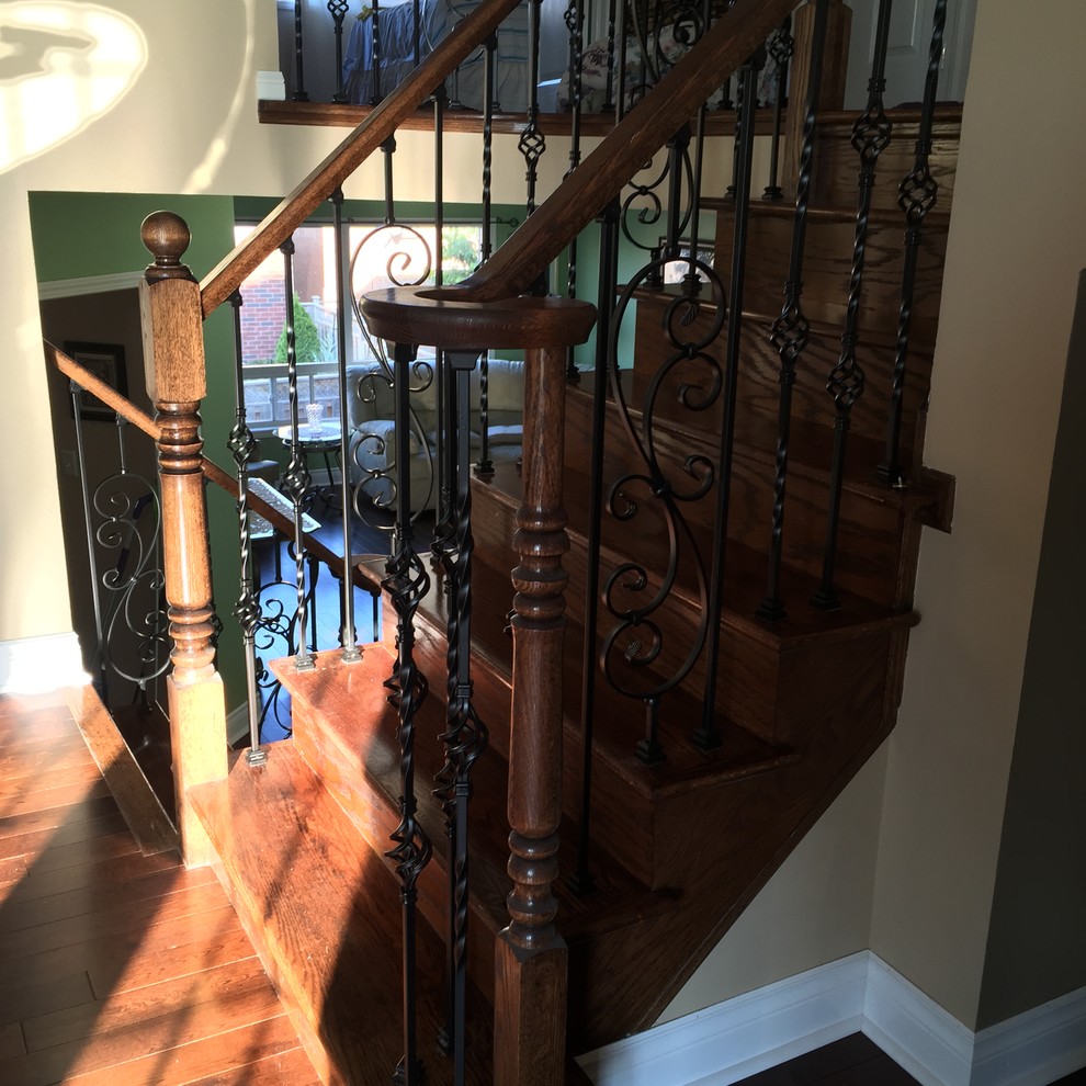 Stairs with New Iron Pickets Traditional Staircase Toronto by Z