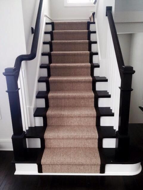 Staircase - mid-sized traditional carpeted u-shaped wood railing staircase idea in Chicago with carpeted risers