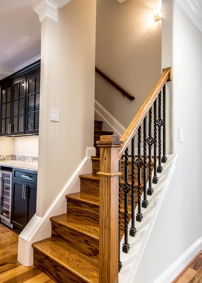 Mid-sized southwest metal l-shaped mixed material railing staircase photo in Richmond