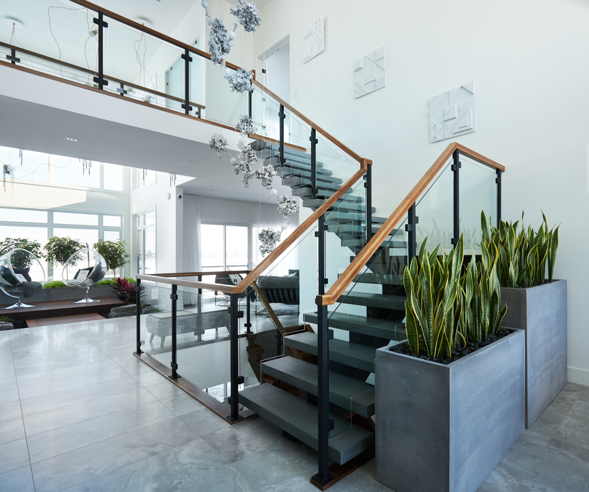 https://st.hzcdn.com/simgs/pictures/staircases/steel-and-concrete-mono-stringer-with-clamped-glass-railing-system-specialized-stair-and-rail-img~385173120d13d33e_14-5513-1-4b38eb8.jpg