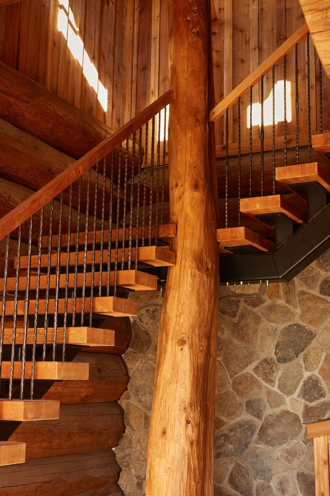 Staircase - rustic wooden floating open and mixed material railing staircase idea in Edmonton