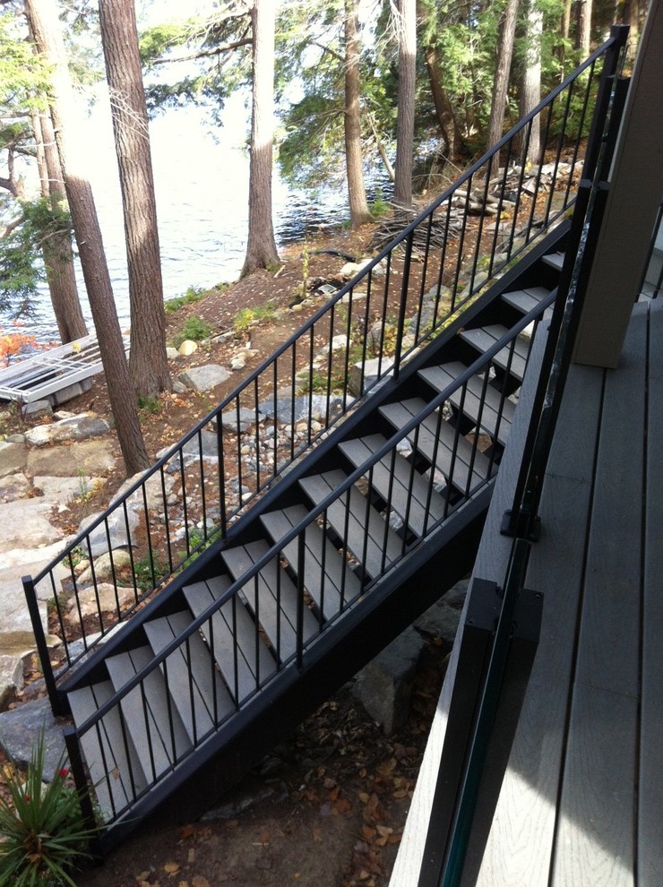 Пример оригинального дизайна: прямая лестница в современном стиле с деревянными ступенями без подступенок