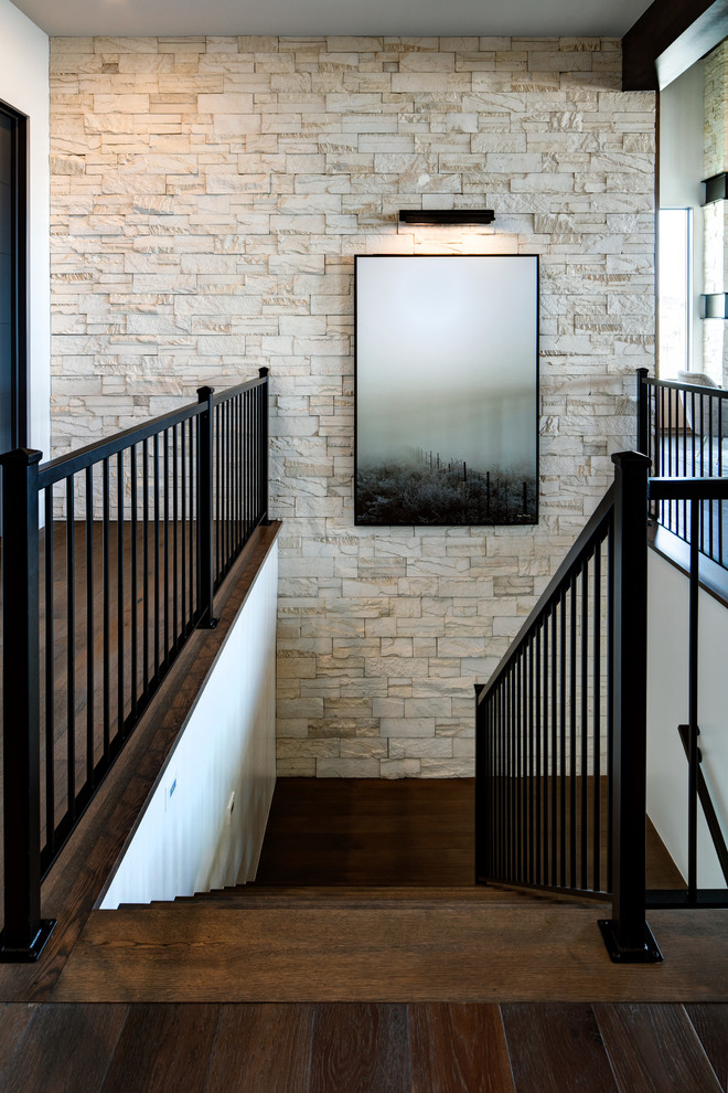Design ideas for a medium sized contemporary wood u-shaped metal railing staircase in Salt Lake City with wood risers.