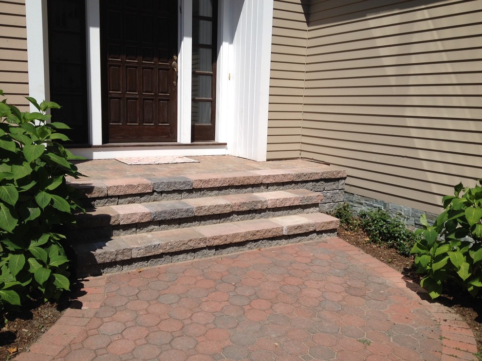 Example of a classic concrete straight staircase design in Bridgeport with concrete risers