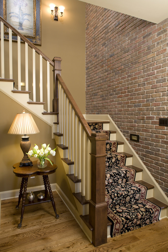 Mid-sized farmhouse wooden l-shaped staircase photo in Minneapolis with painted risers