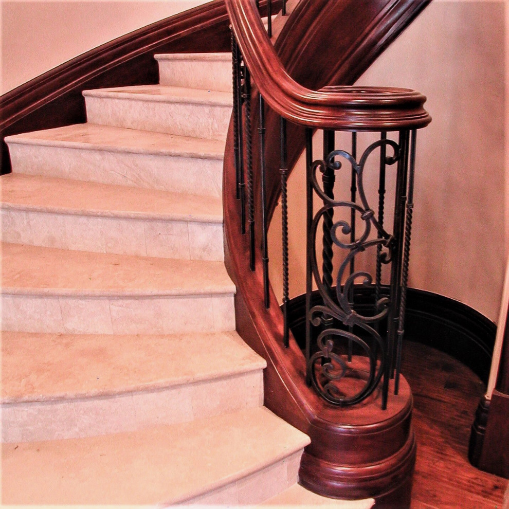 Inspiration for a medium sized classic spiral wood railing staircase in Salt Lake City.