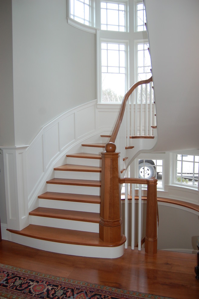 Staircase - traditional wooden wood railing staircase idea in Boston with painted risers