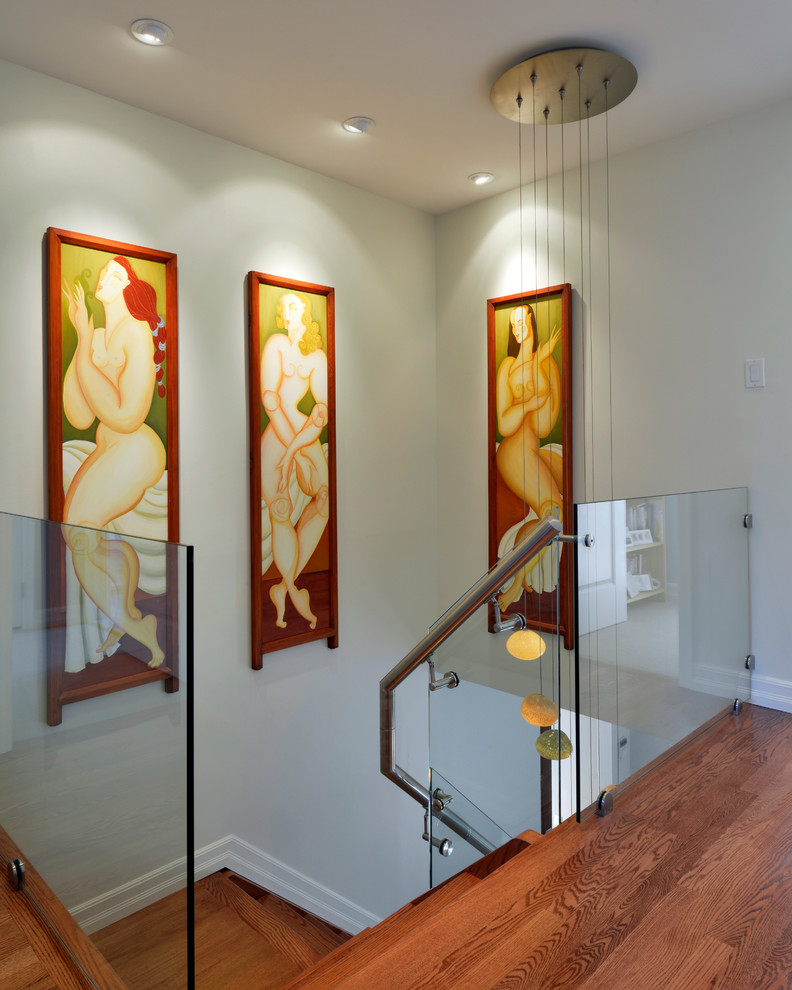 Example of a trendy wooden staircase design in Ottawa with wooden risers