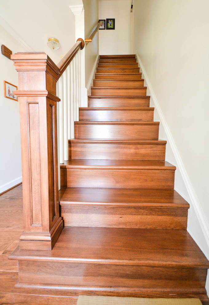 Staircase - mid-sized farmhouse wooden straight staircase idea in DC Metro with wooden risers