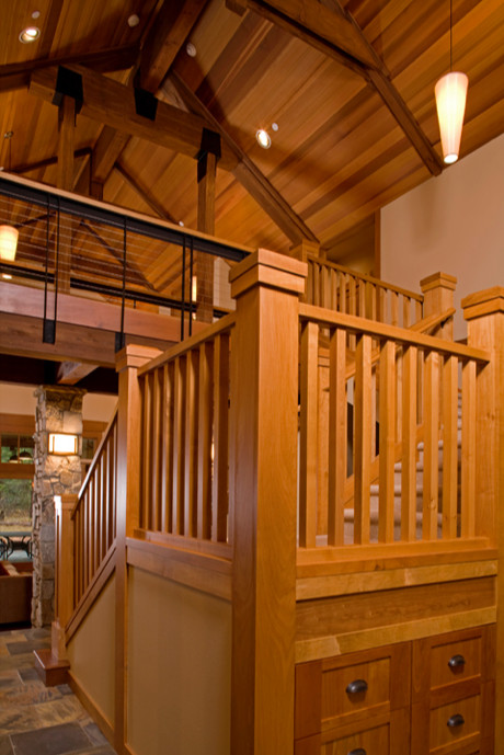 Staircase - mid-sized contemporary wooden u-shaped staircase idea in Seattle with wooden risers