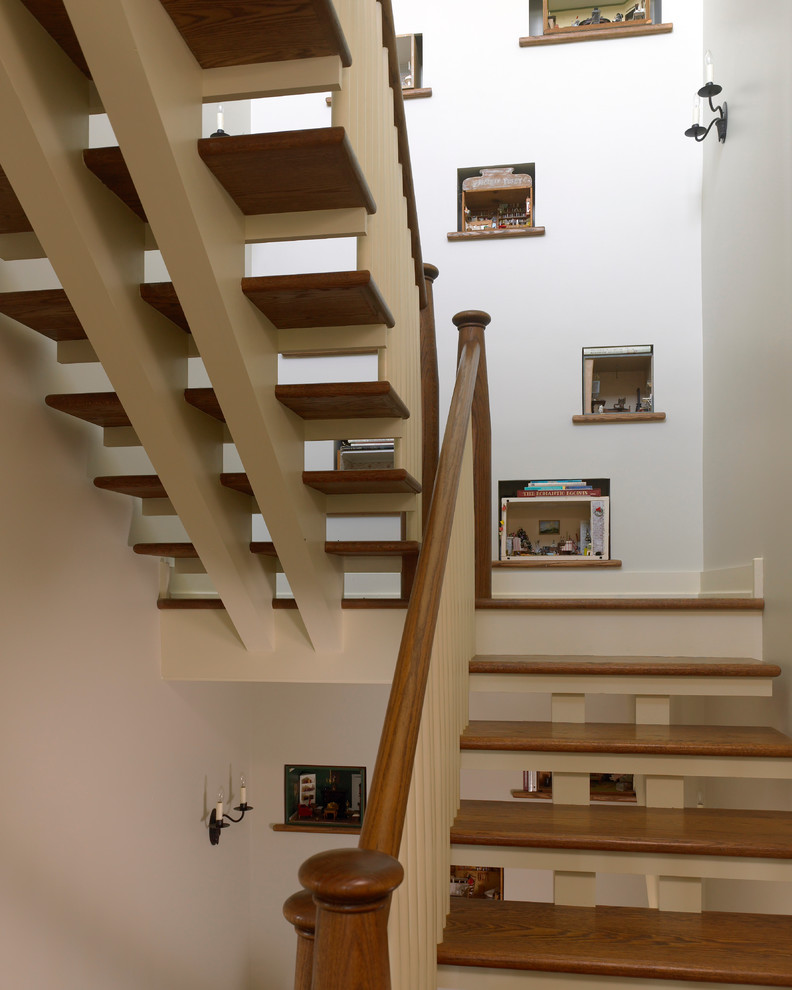 Modelo de escalera en U clásica renovada sin contrahuella con escalones de madera
