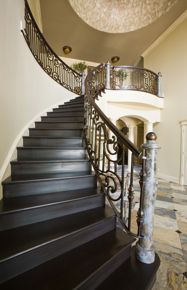 Mid-sized ornate wooden straight staircase photo in New York with painted risers