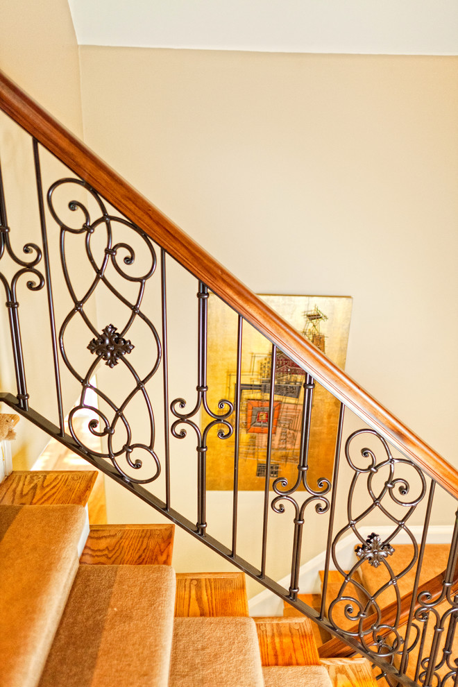 Inspiration for a medium sized traditional wood straight staircase in Philadelphia with painted wood risers.
