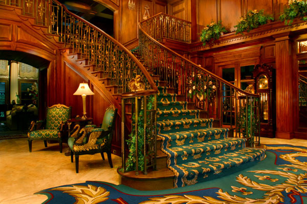 Photo of a traditional staircase in Grand Rapids with feature lighting.