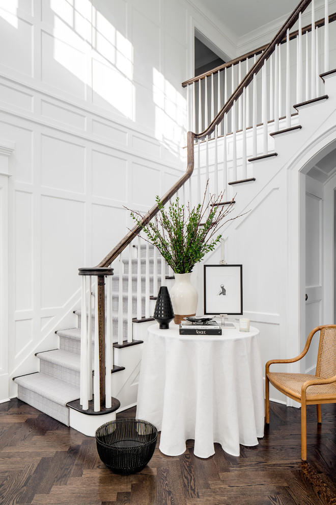 Inspiration for a classic wood l-shaped wood railing staircase in New York with painted wood risers.