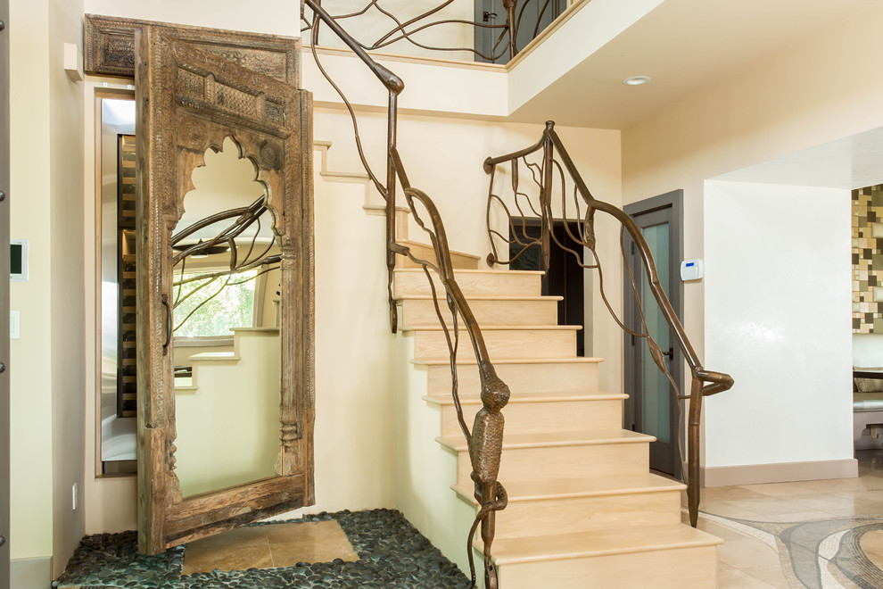 Example of a large eclectic wooden l-shaped staircase design in Los Angeles with wooden risers