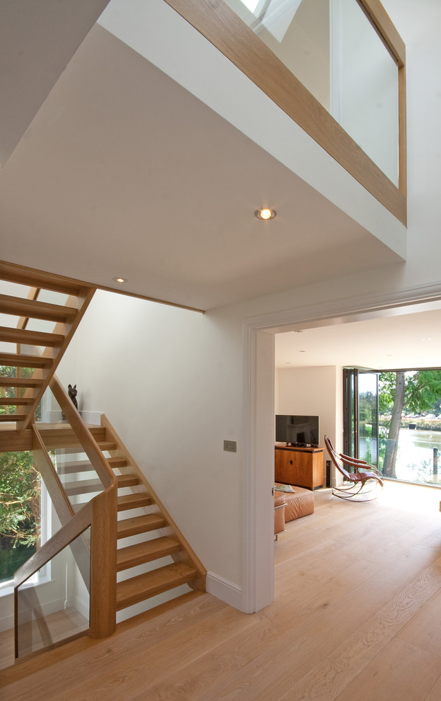 Photo of a medium sized contemporary staircase in London.