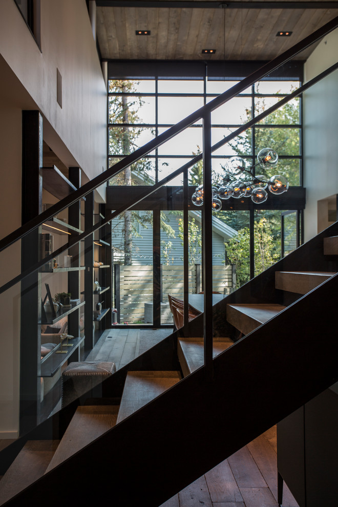 Trendy wooden open and metal railing staircase photo in Salt Lake City