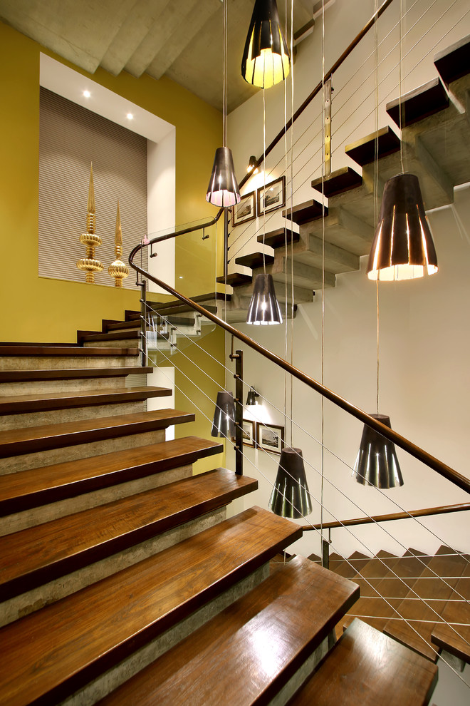 Example of a trendy staircase design in Ahmedabad