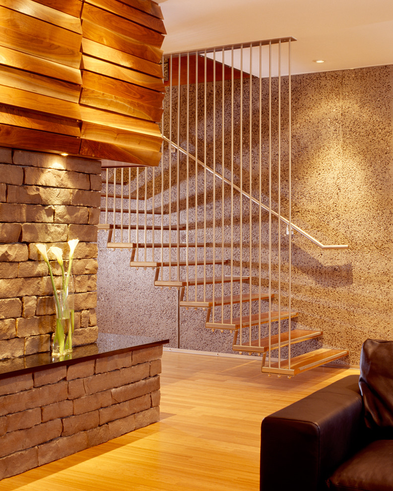 This is an example of a modern floating staircase in Kansas City with open risers.