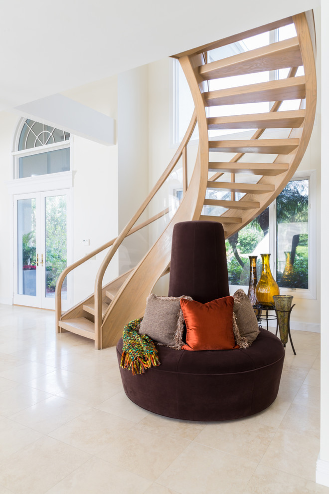 This is an example of a medium sized modern curved staircase in Miami.
